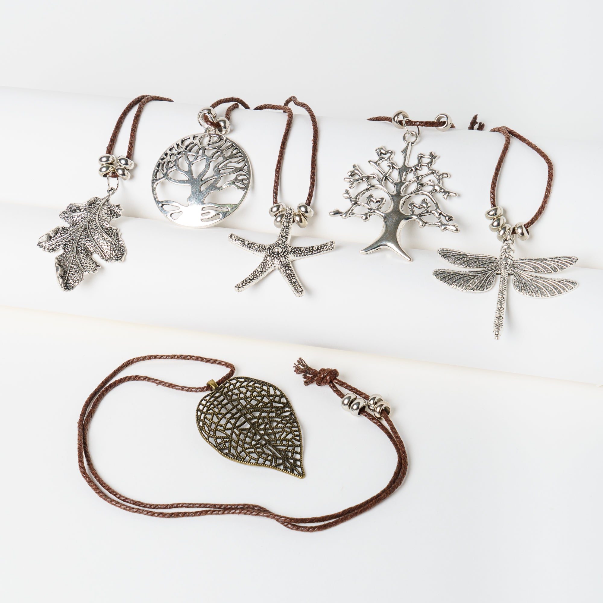 Collana con pendente in acciaio a tema natura, sorprese per uova di pasqua, bigiotteria